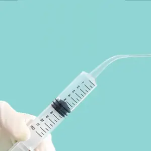 seringa de cotovelo para alimentação de pássaros