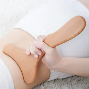 massageador de madeira para contorno corporal