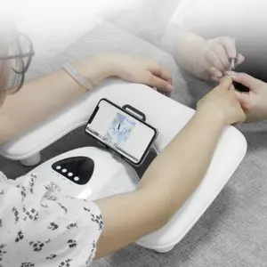 travesseiro de manicure com suporte para telefone