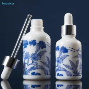 frasco conta-gotas de vidro floral azul e branco